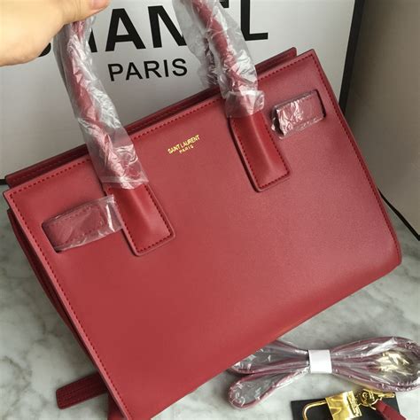 ysl dark red wine bag|red YSL Bag with tassel.